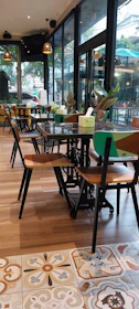 A warm and inviting interior of a modern café with wooden textures.