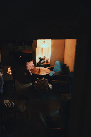 Vintage-style cozy therapy room with warm lighting and mystical decor.