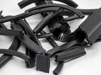 Close-up of various rubber seals neatly arranged on a wooden table