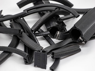 Close-up of rubber sheets stacked in a manufacturing facility.