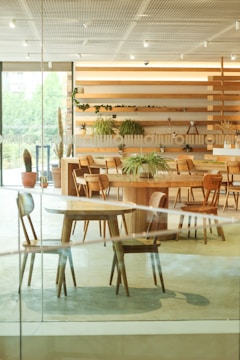 Office space interior with warm wooden accents and green plants.