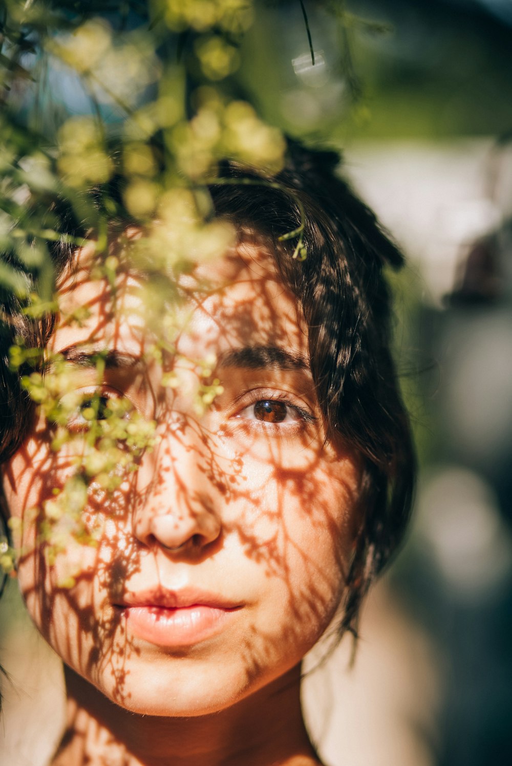 a young girl with freckles on her face