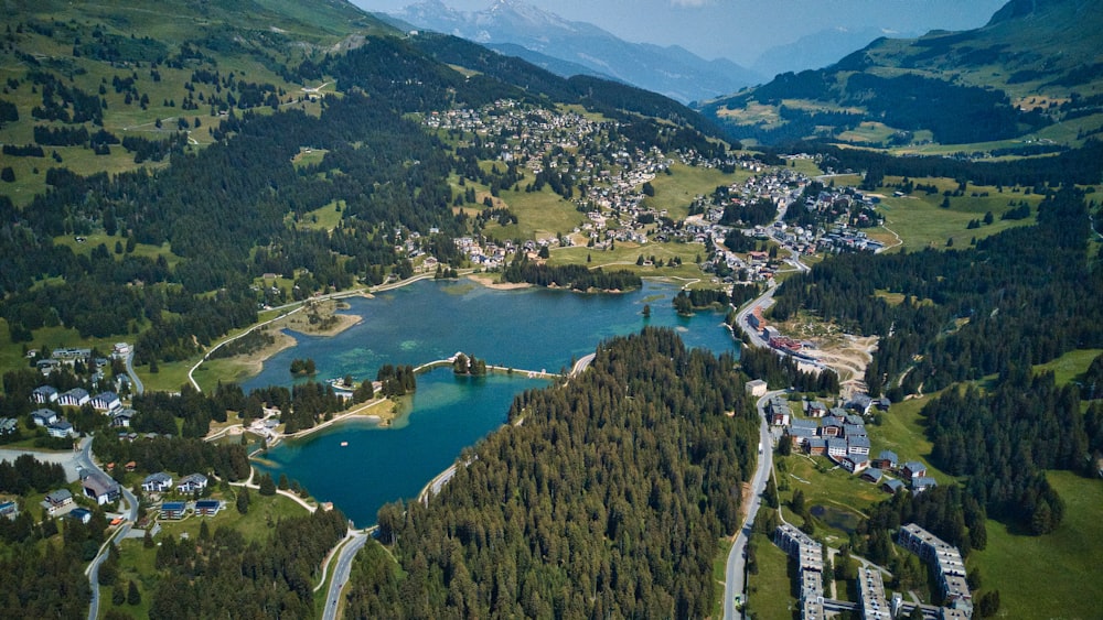 a bird's eye view of a lake surrounded by mountains