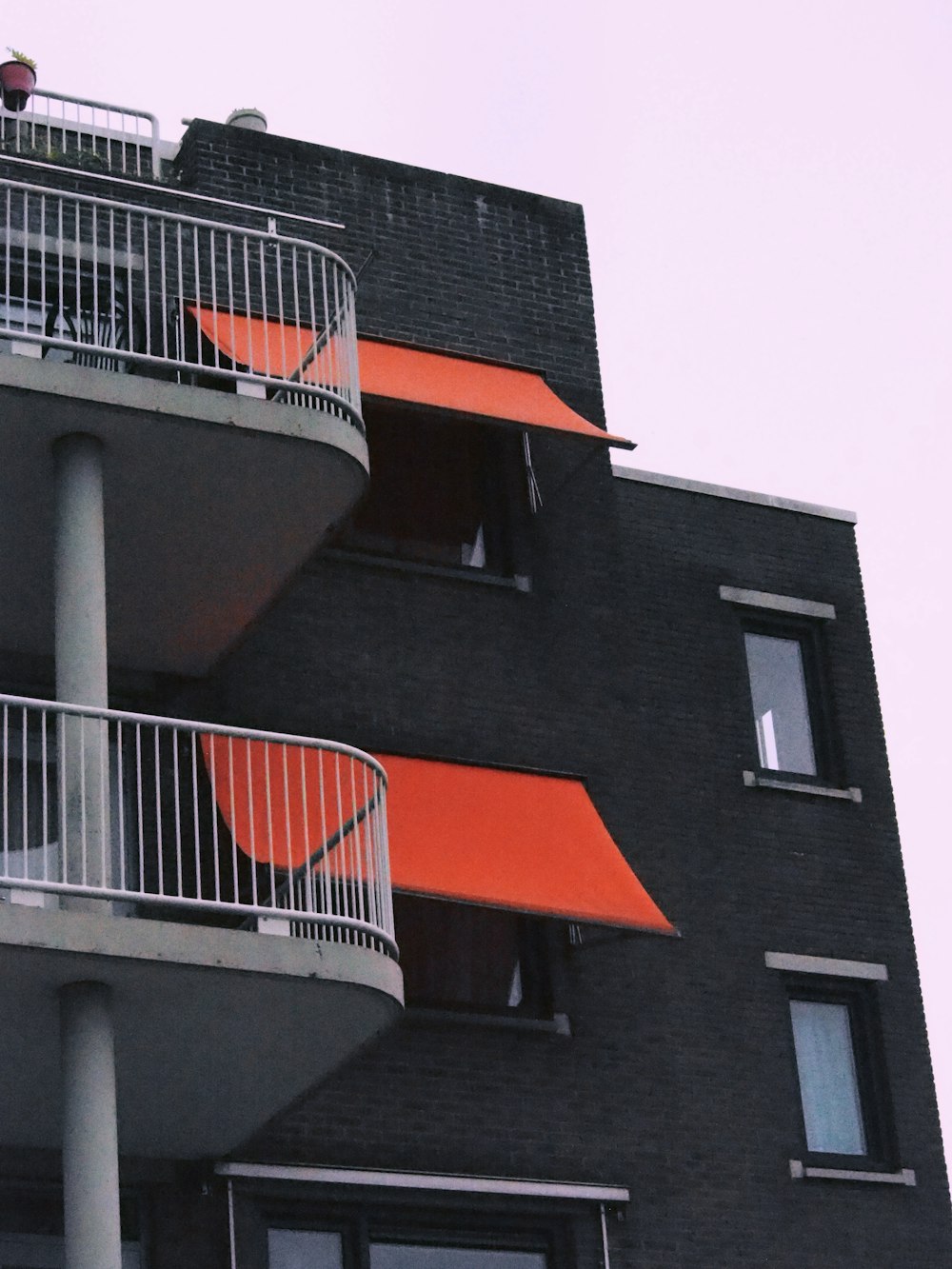 a tall building with balconies and balconies on the balconies