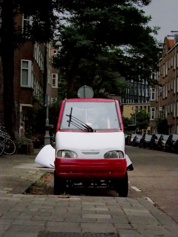 A medical transport vehicle on a quiet suburban street.
