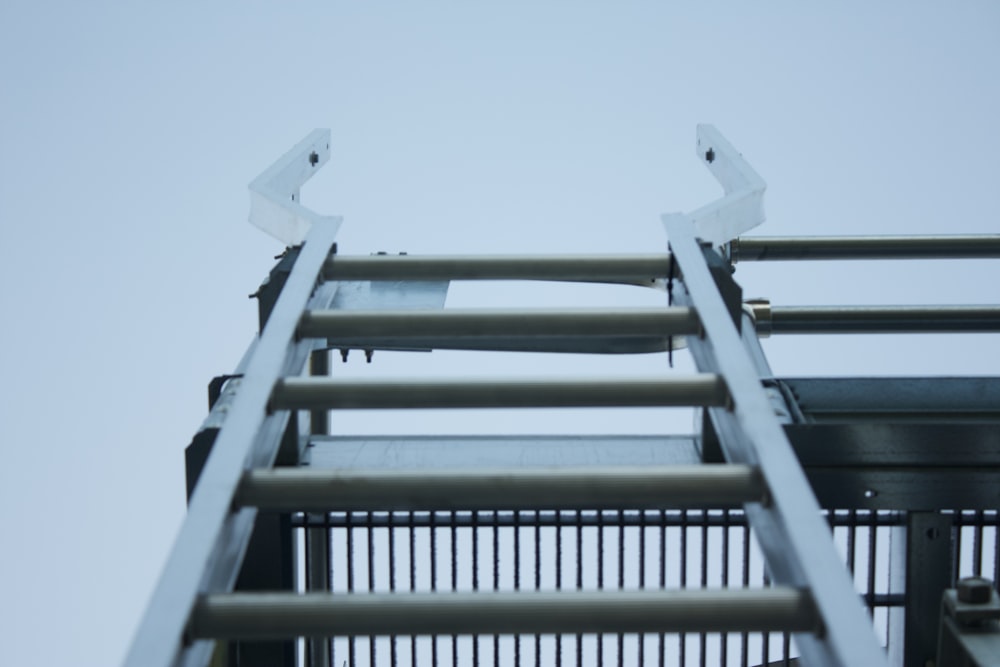 a ladder going up to the top of a building