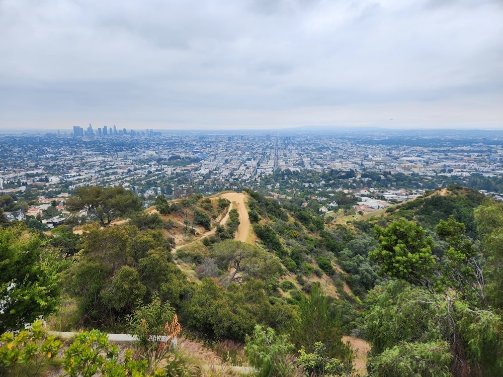 a view of a city from a hill