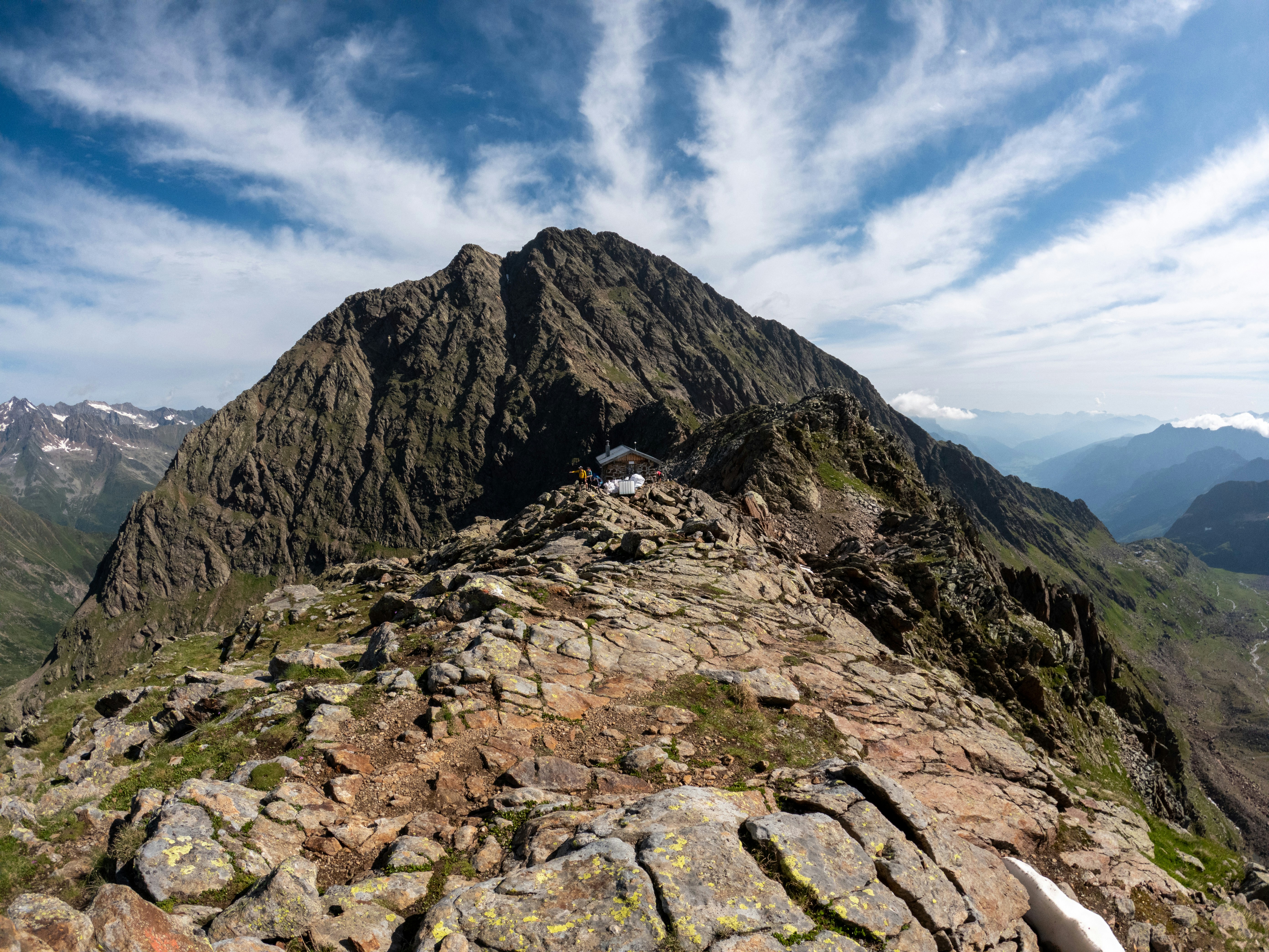 A view of a mountain from the top of a mountain