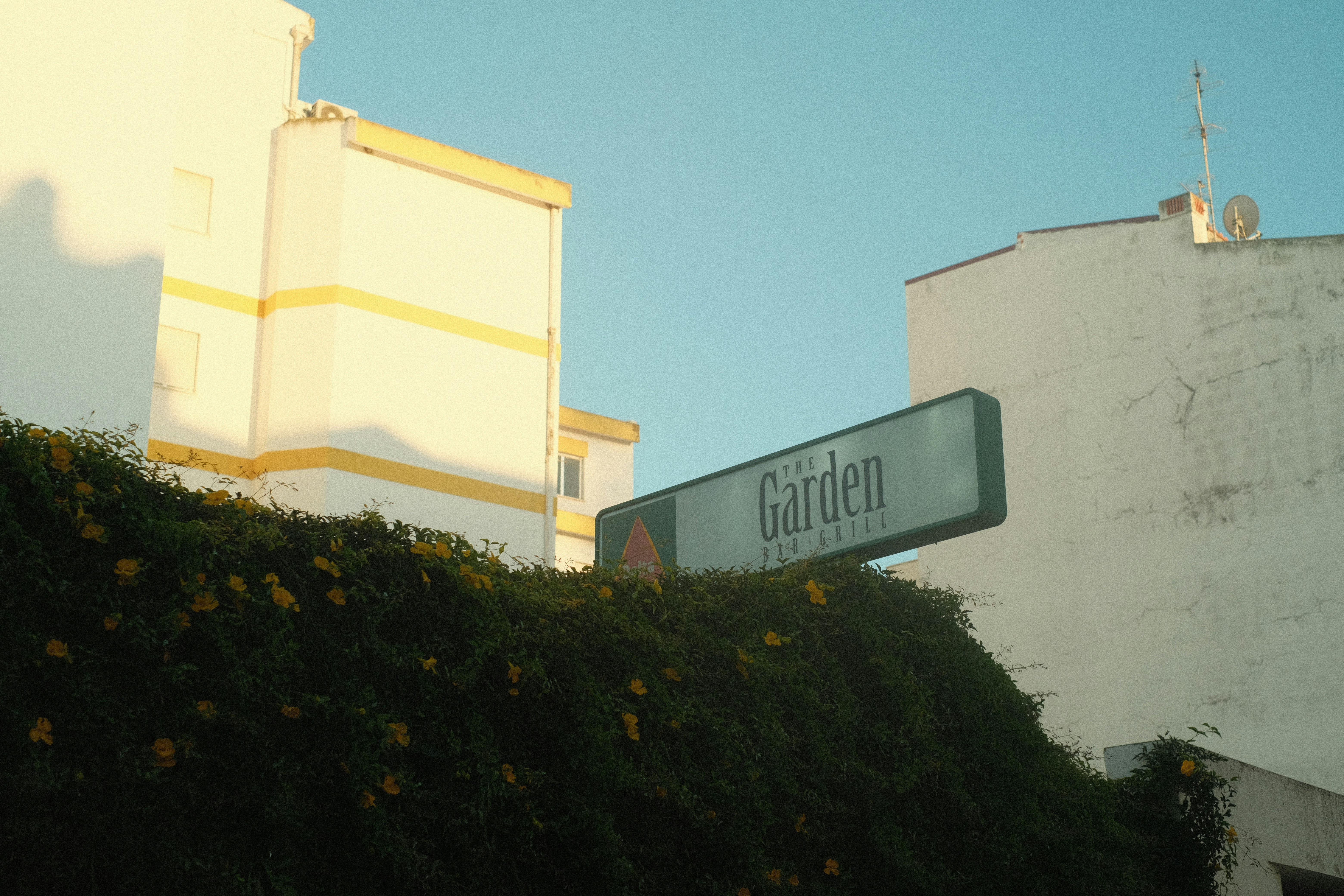 a street sign on the side of a building