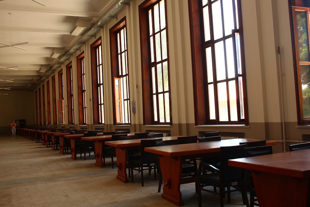 a row of tables in a large room