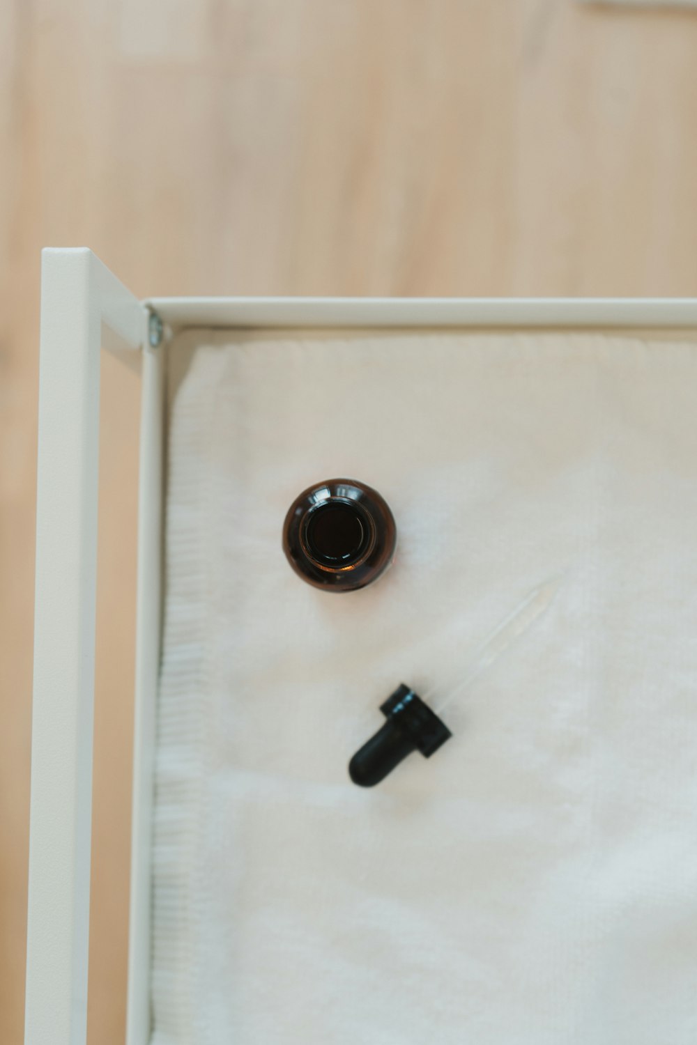 a bottle of wine sitting inside of a wooden box