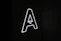 a neon sign with an arrow on it