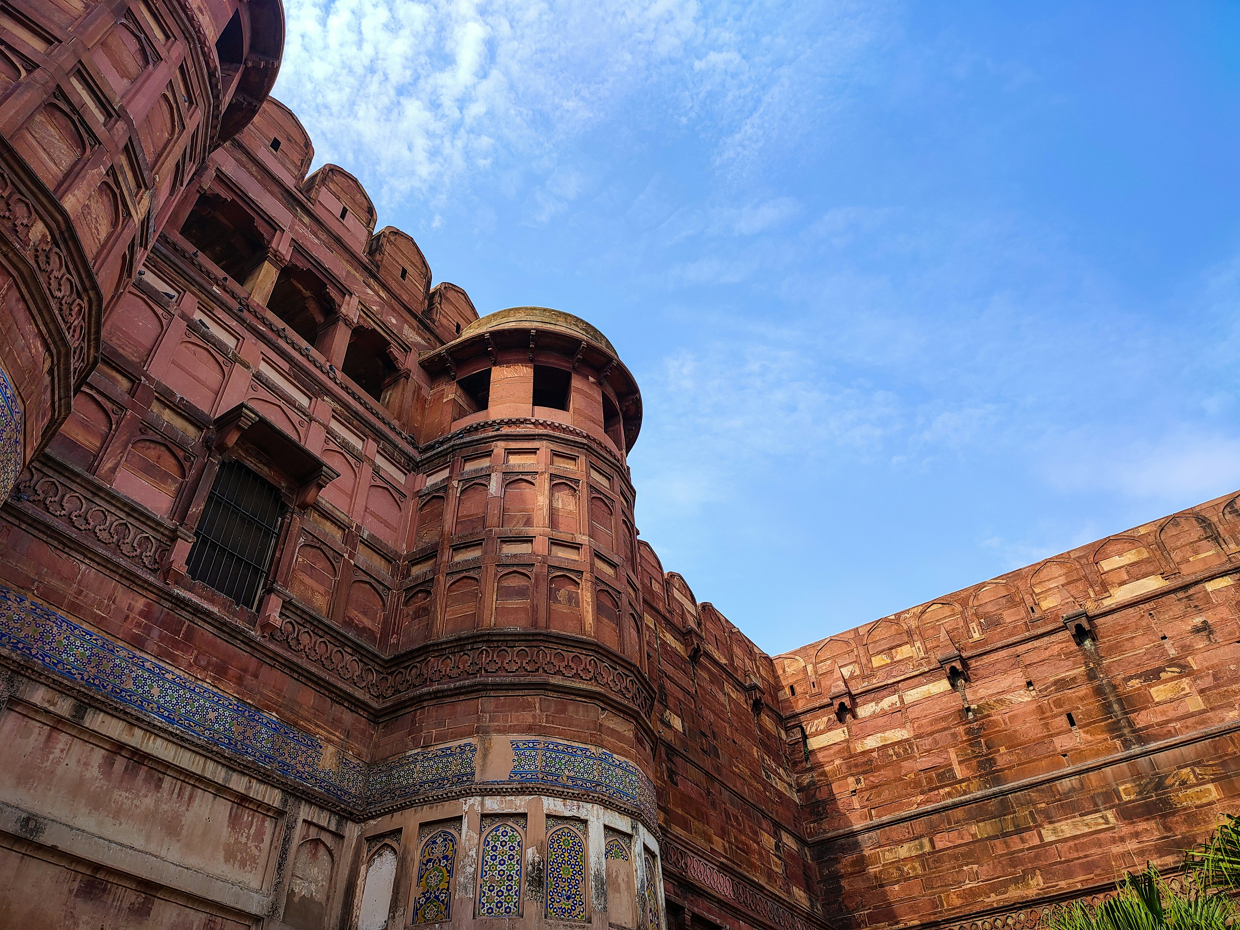 a large brick building with a sky background