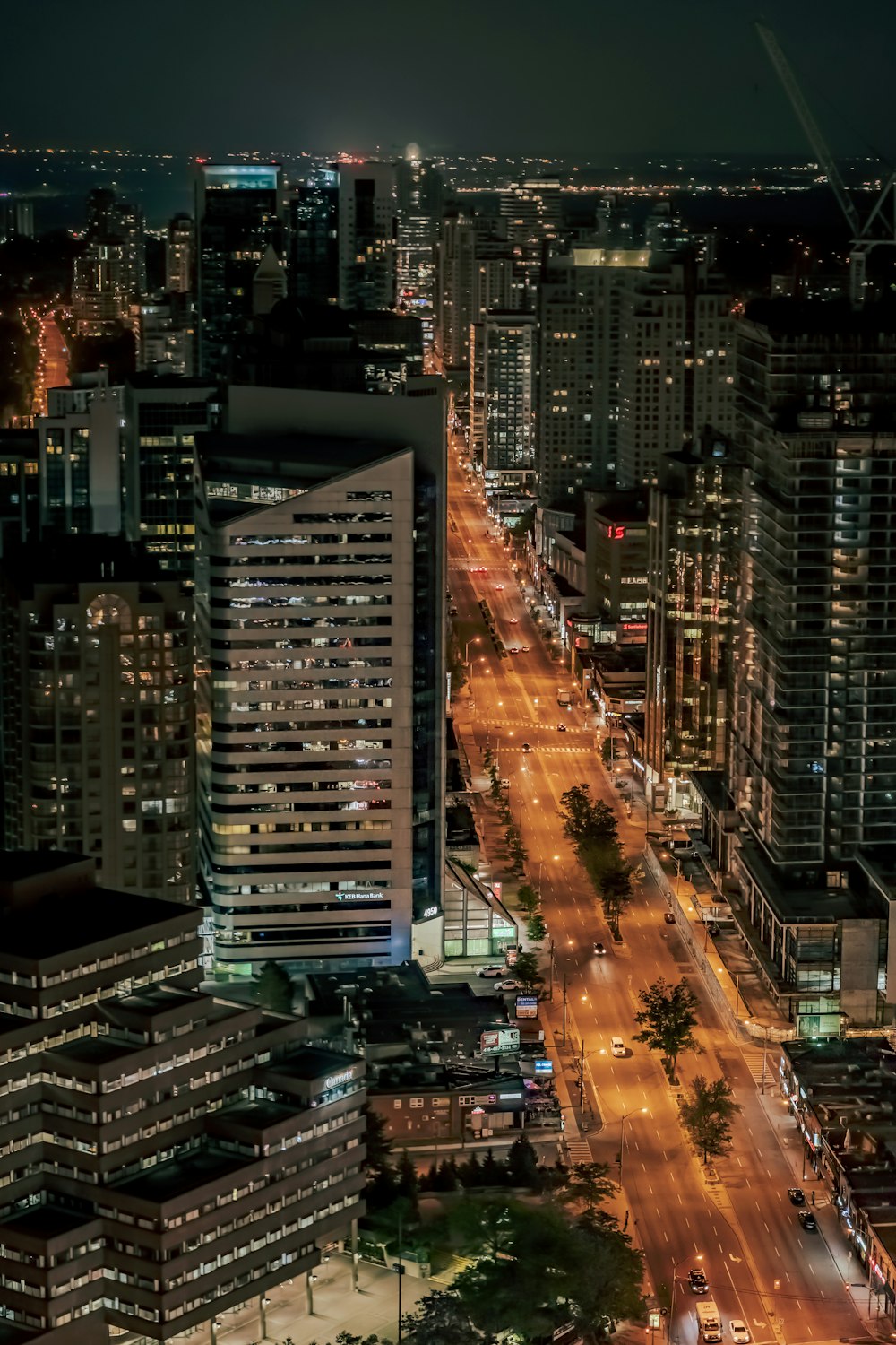 a view of a city at night from the top of a building