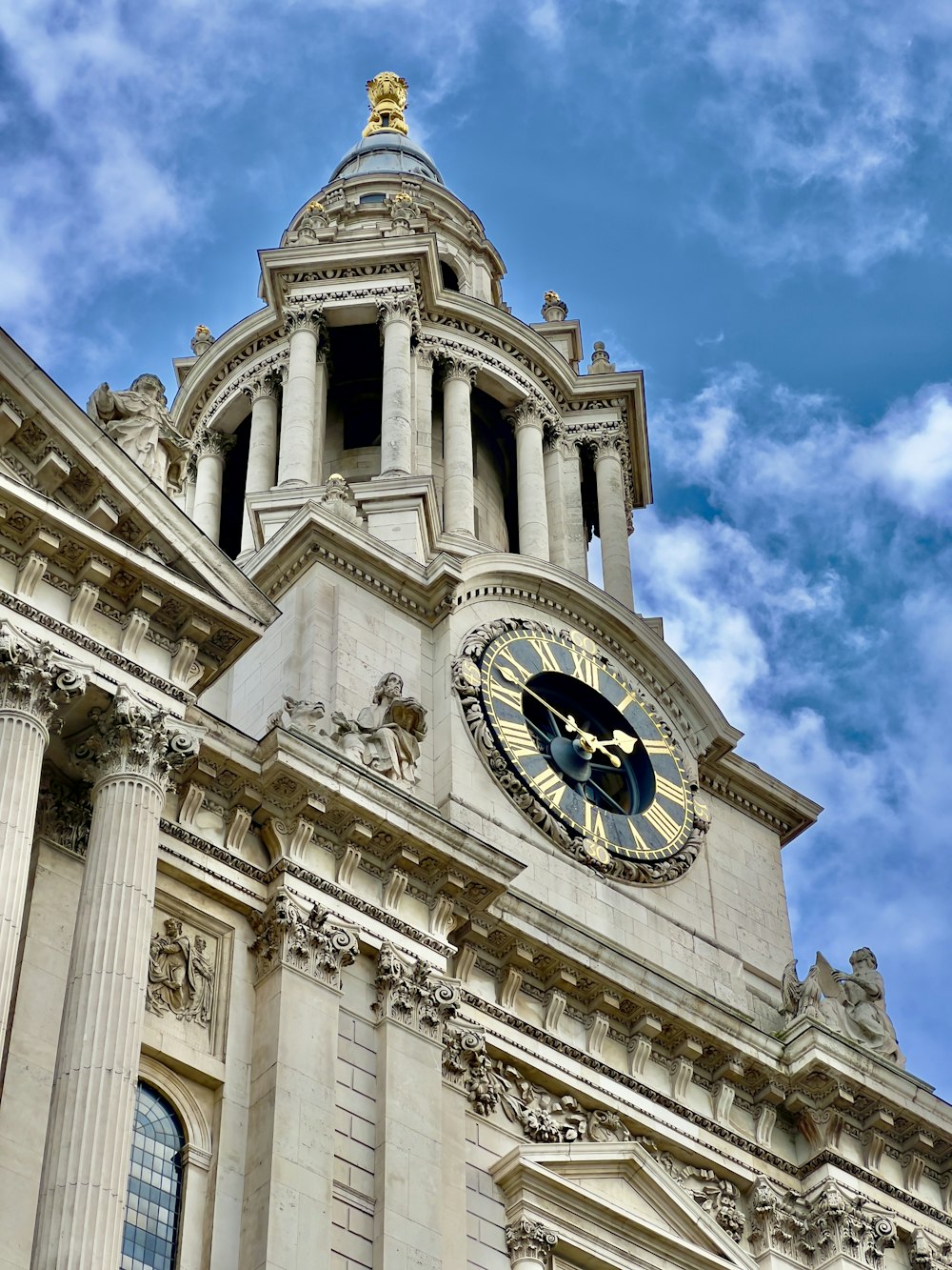 a large building with a clock on the side of it