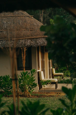 Cozy Wendy house converted into a small office, surrounded by lush greenery near Durban coast.