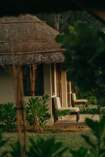 Cozy Wendy house converted into a small office, surrounded by lush greenery near Durban coast.