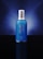 A blue bottle with a silver cap is centered against a dark blue gradient background. The bottle features white text displaying its brand and product name.