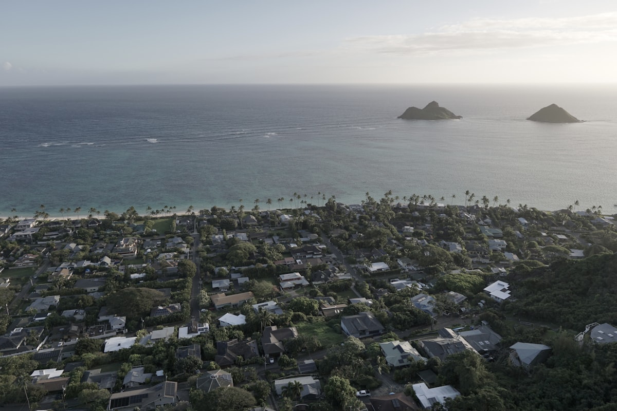 Aerial view of Hawaii neighborhood with ocean and islands