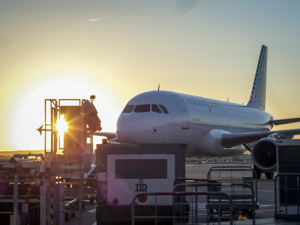 a large jetliner sitting on top of an airport tarmac