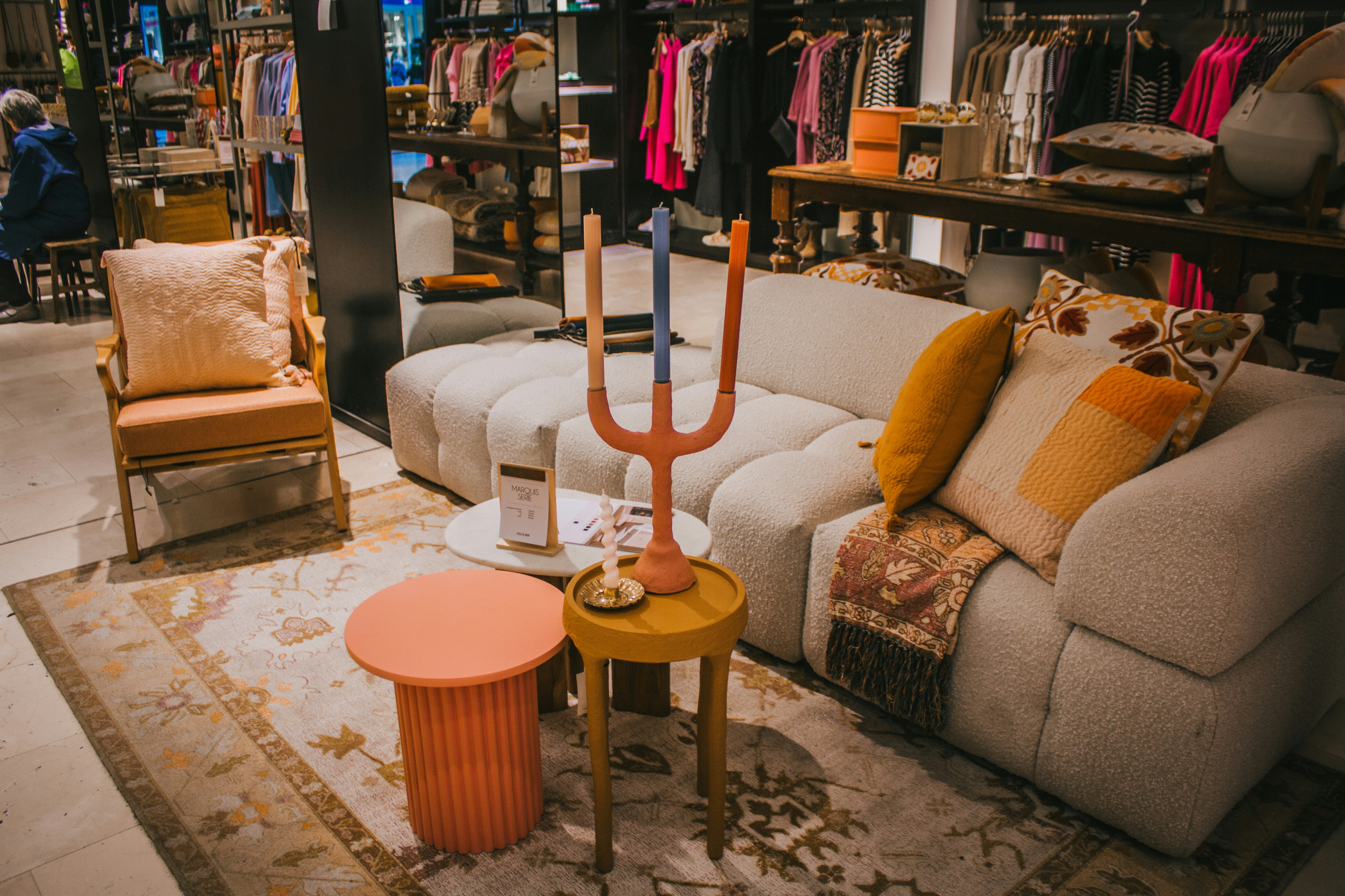 a living room filled with lots of furniture