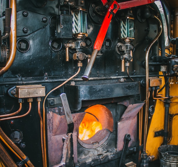 a close up of an old fashioned steam engine