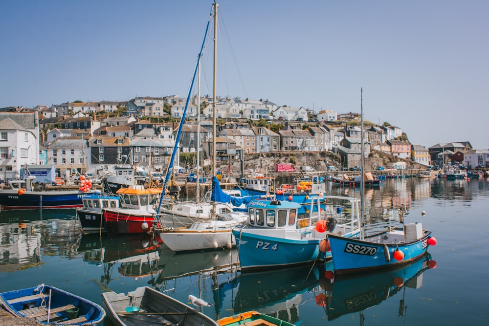 a group of boats that are sitting in the water