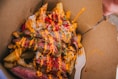 a box of food with a fork in it