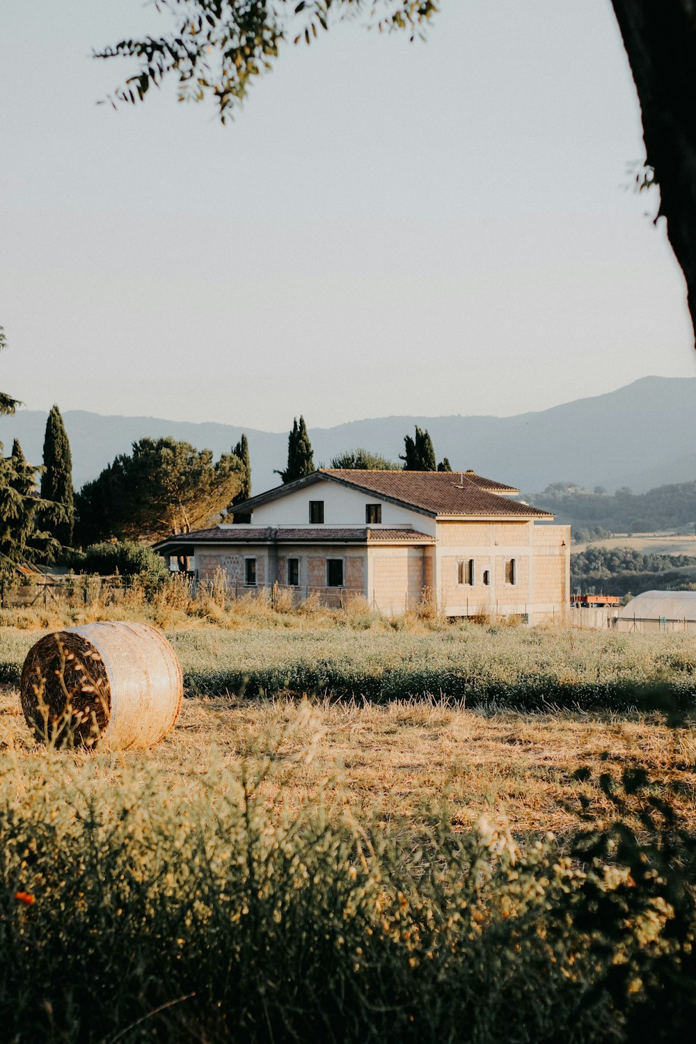 a large round hay bale sitting in a field