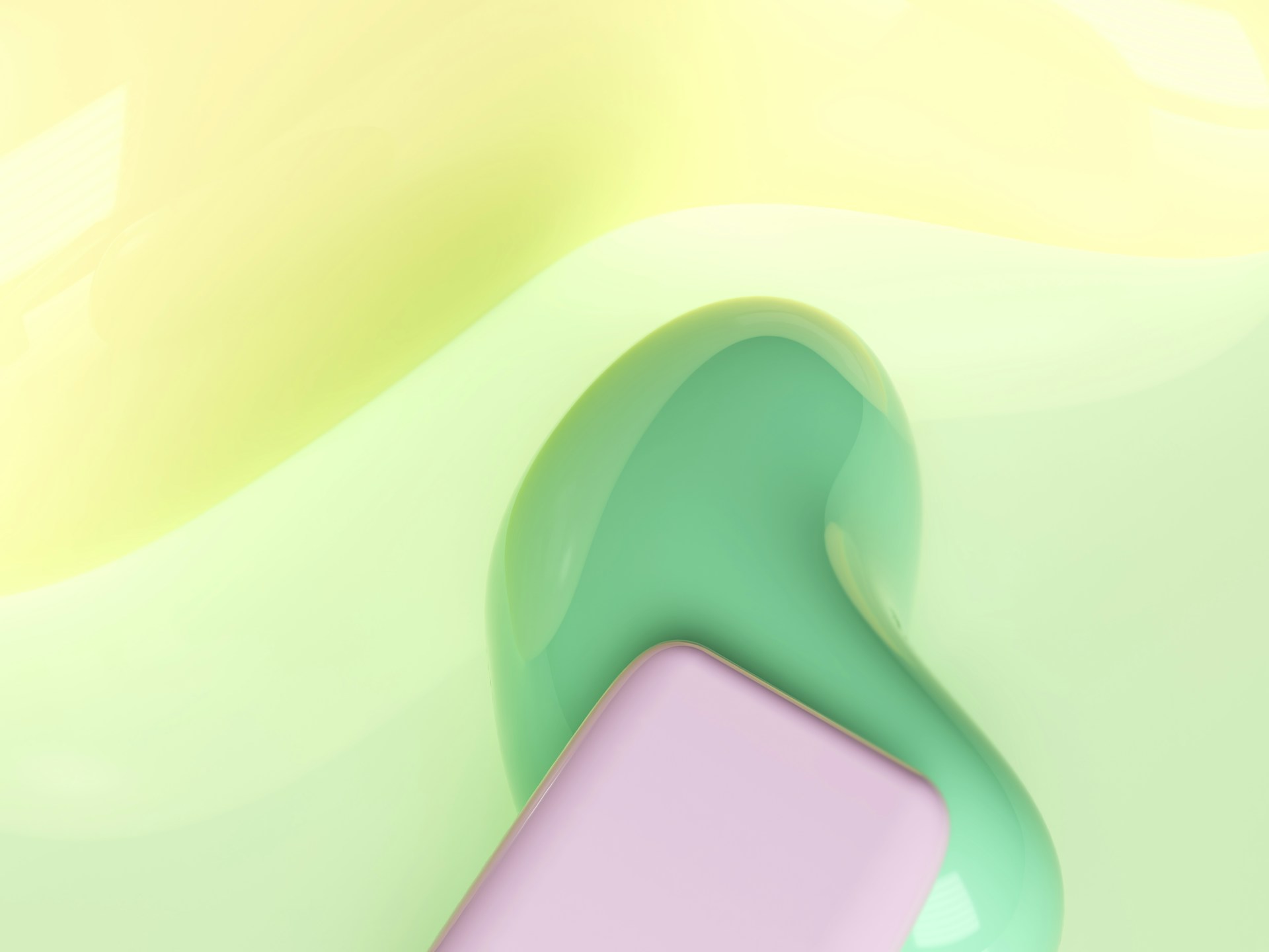 a pink and green object sitting on top of a table