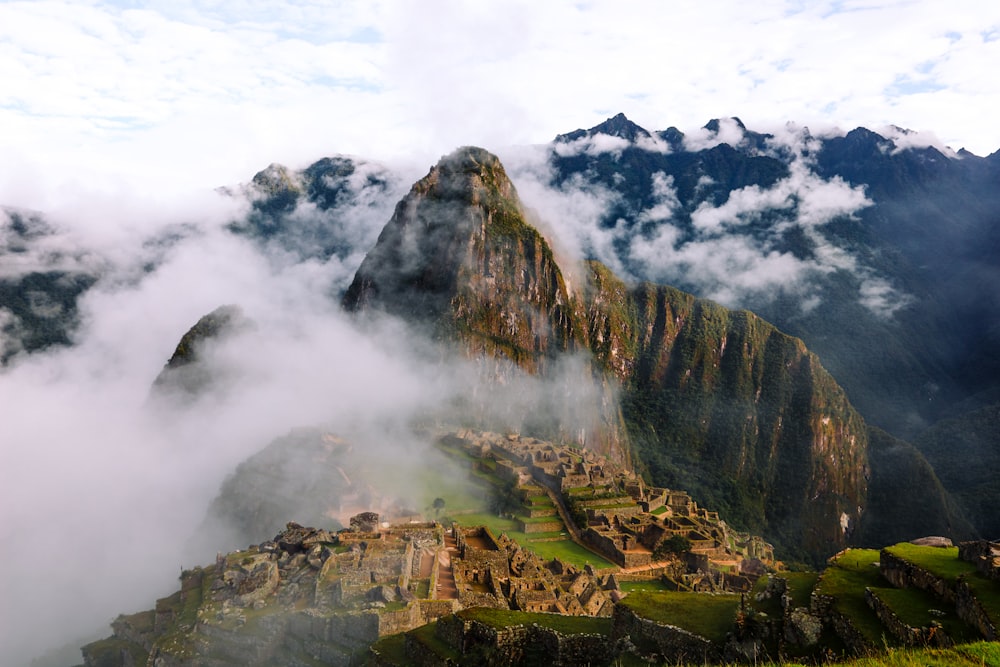 a view of a mountain with a small village in the middle of it