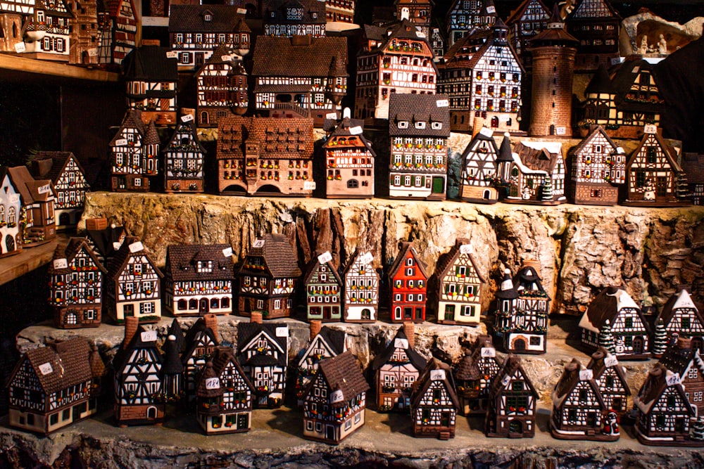 a display of wooden houses on display in a store
