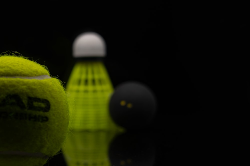 a close up of a tennis ball on a table