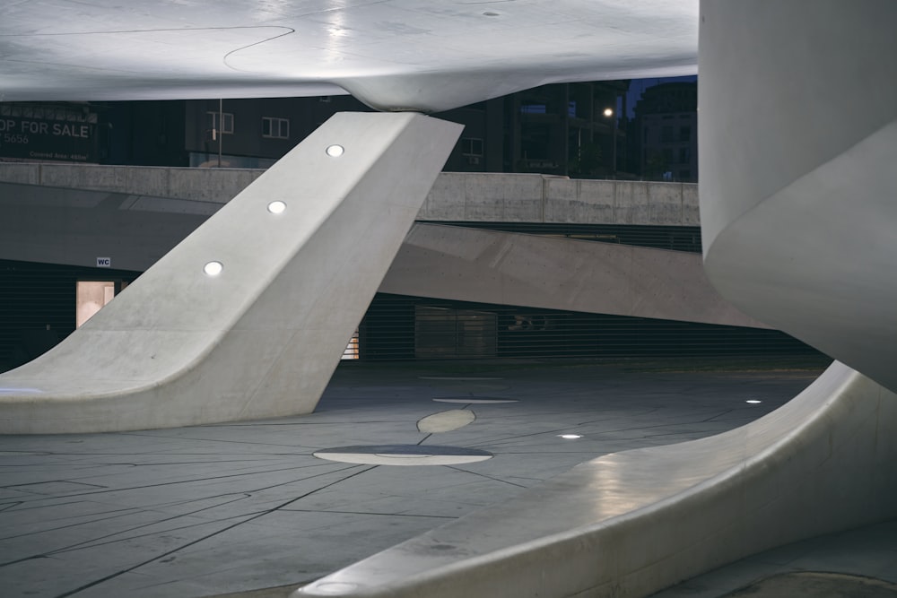 a large concrete structure with a ramp in the middle of it