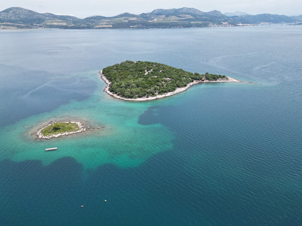 a small island in the middle of a body of water