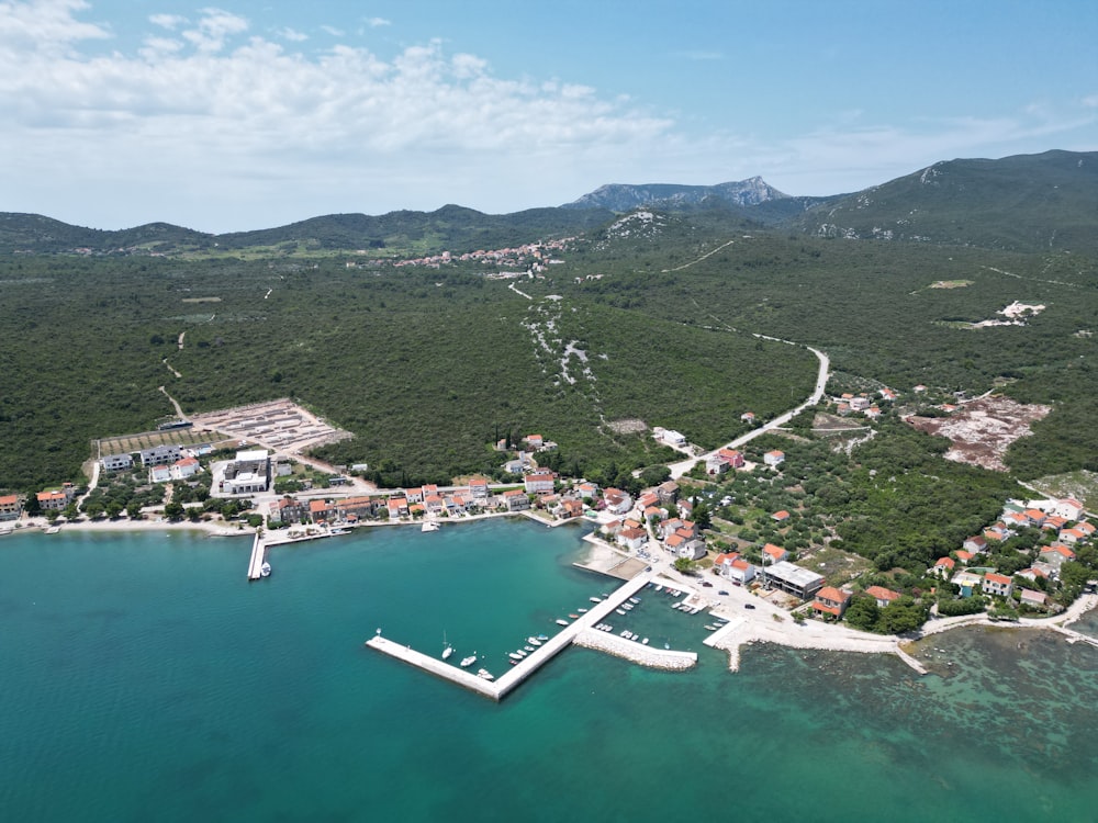 a bird's eye view of an island with a dock