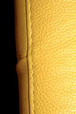 Before and after shots showing faded leather restored to rich color.