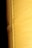 A close-up view of a textured yellow leather surface, displaying visible stitching along a seam. The background is dark, enhancing the texture and color of the leather.