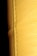 A close-up view of a textured yellow leather surface, displaying visible stitching along a seam. The background is dark, enhancing the texture and color of the leather.