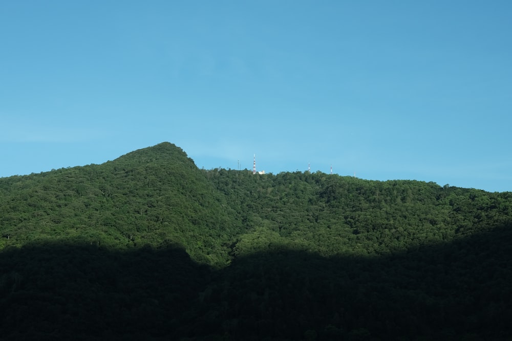 a hill with a tower on top of it