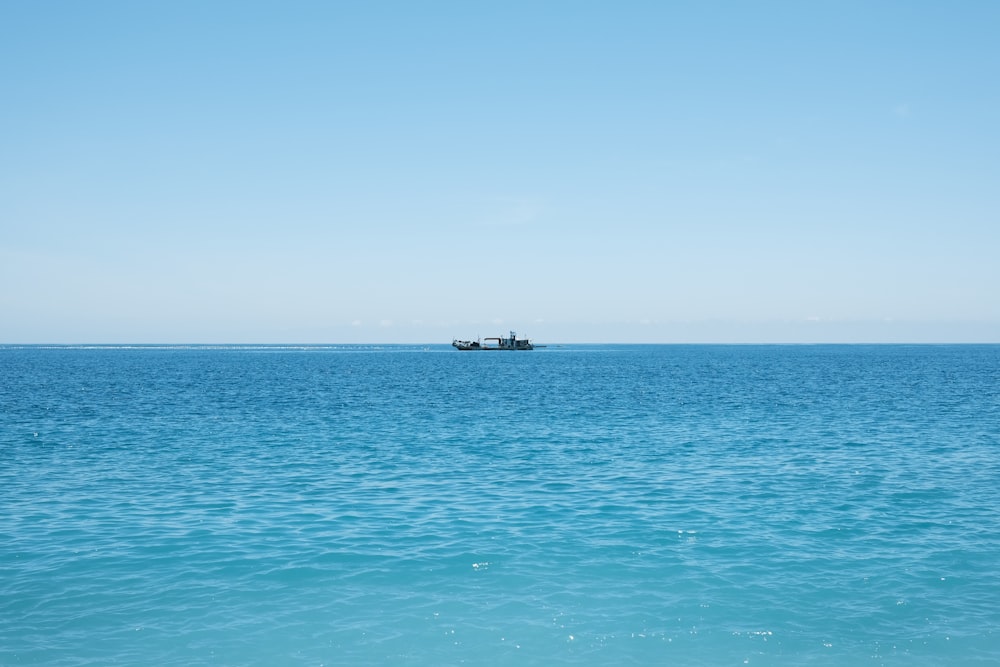 a boat is out in the open water