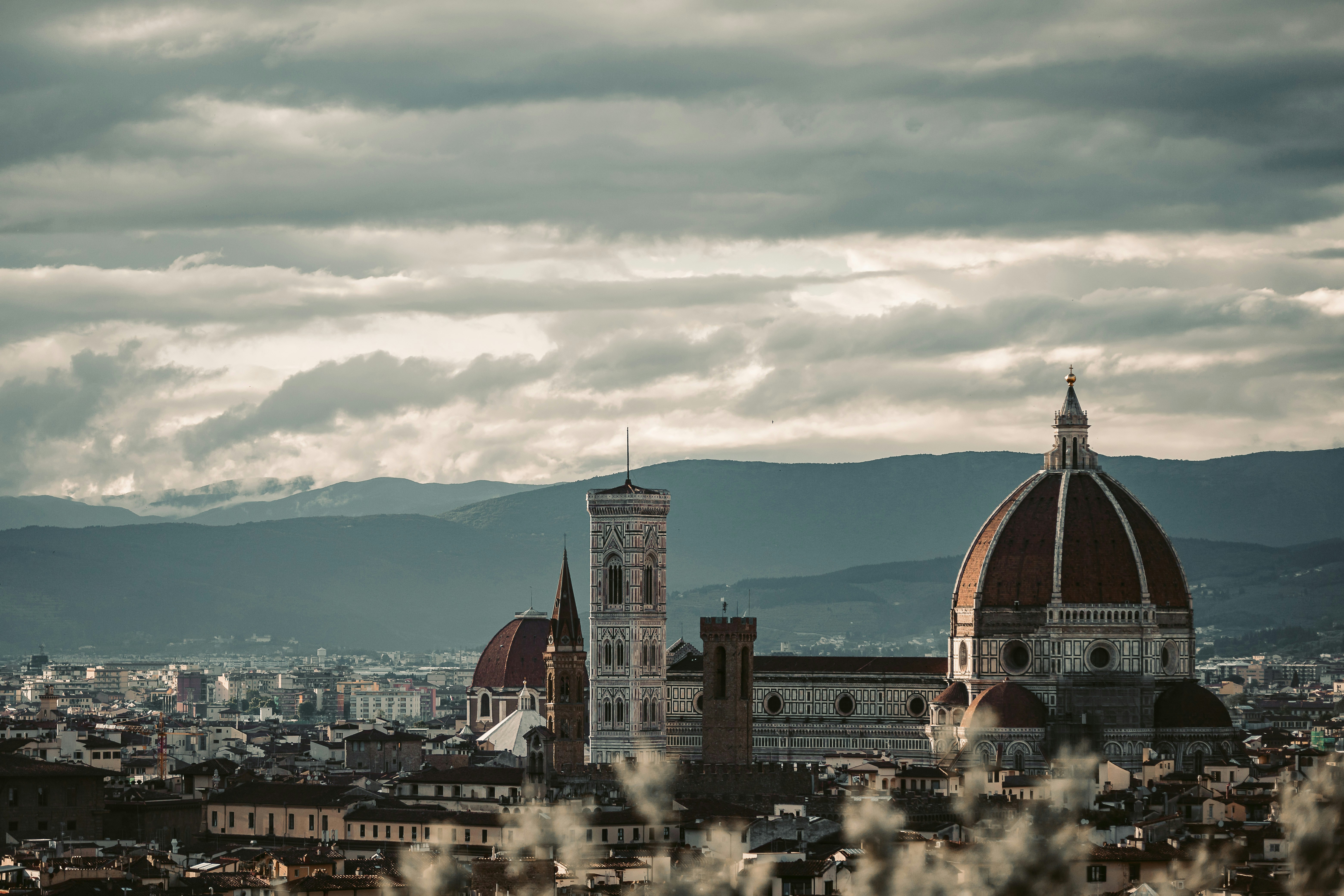 A view of a city with mountains in the background