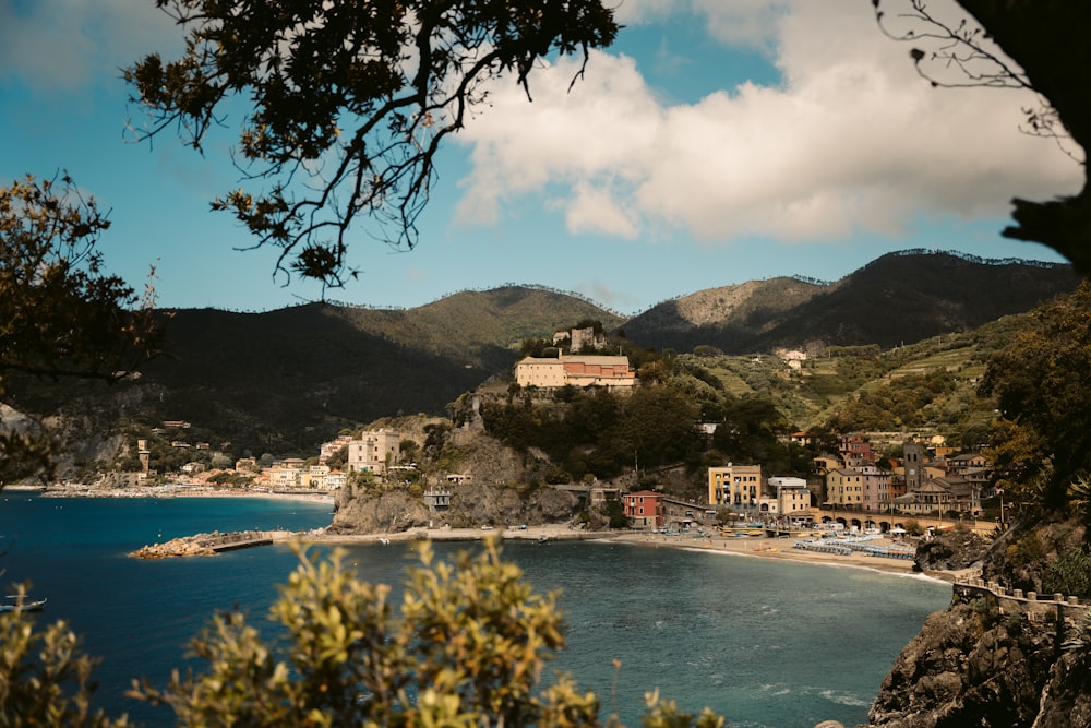 a view of a beach and a town from a distance