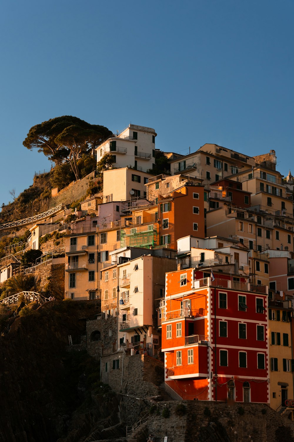 a hillside with lots of buildings on top of it