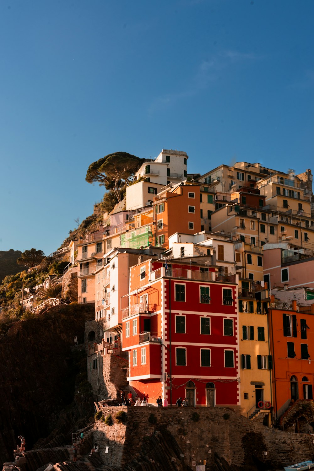 a group of buildings sitting on top of a hill