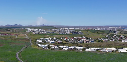 Green open spaces and roads in U.S. Society Phase 2 residential area.