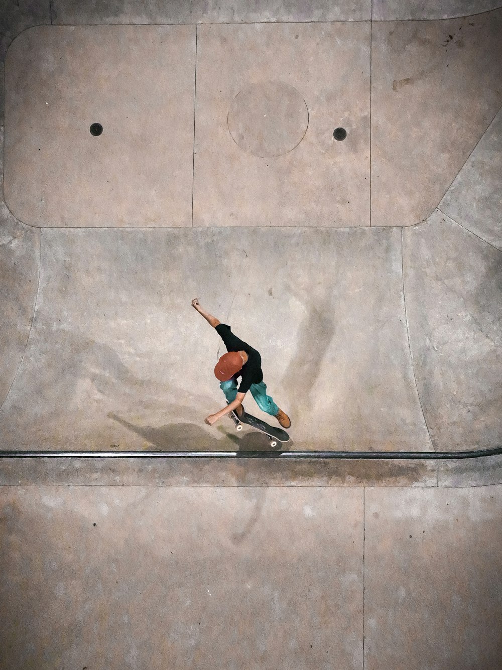 a man riding a skateboard up the side of a ramp