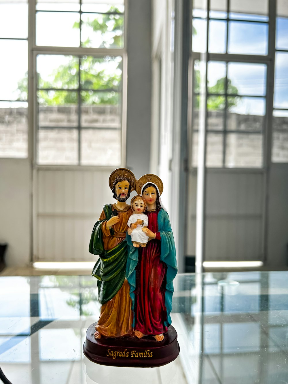 a statue of the virgin mary holding a baby jesus