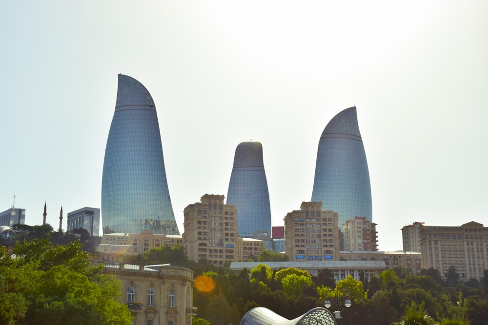 a group of tall buildings sitting next to each other