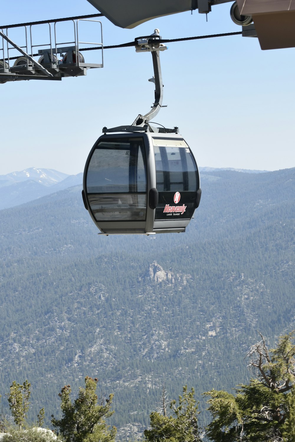 a gondola with a mountain view in the background